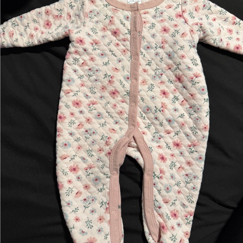 Various baby onesies